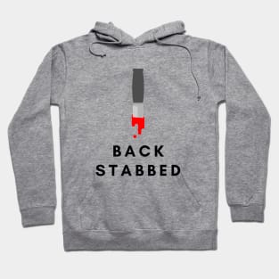 Stabbed in the back- a back stabbing design Hoodie